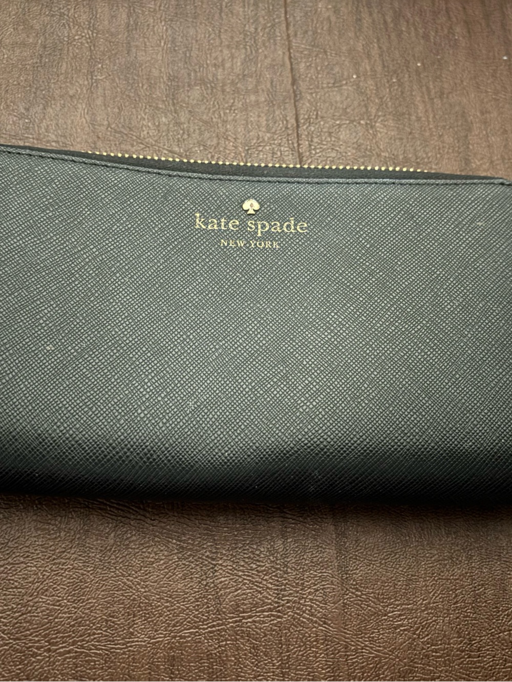 kate spade black saffiano zip-around wristlet wallet with gold logo 8”